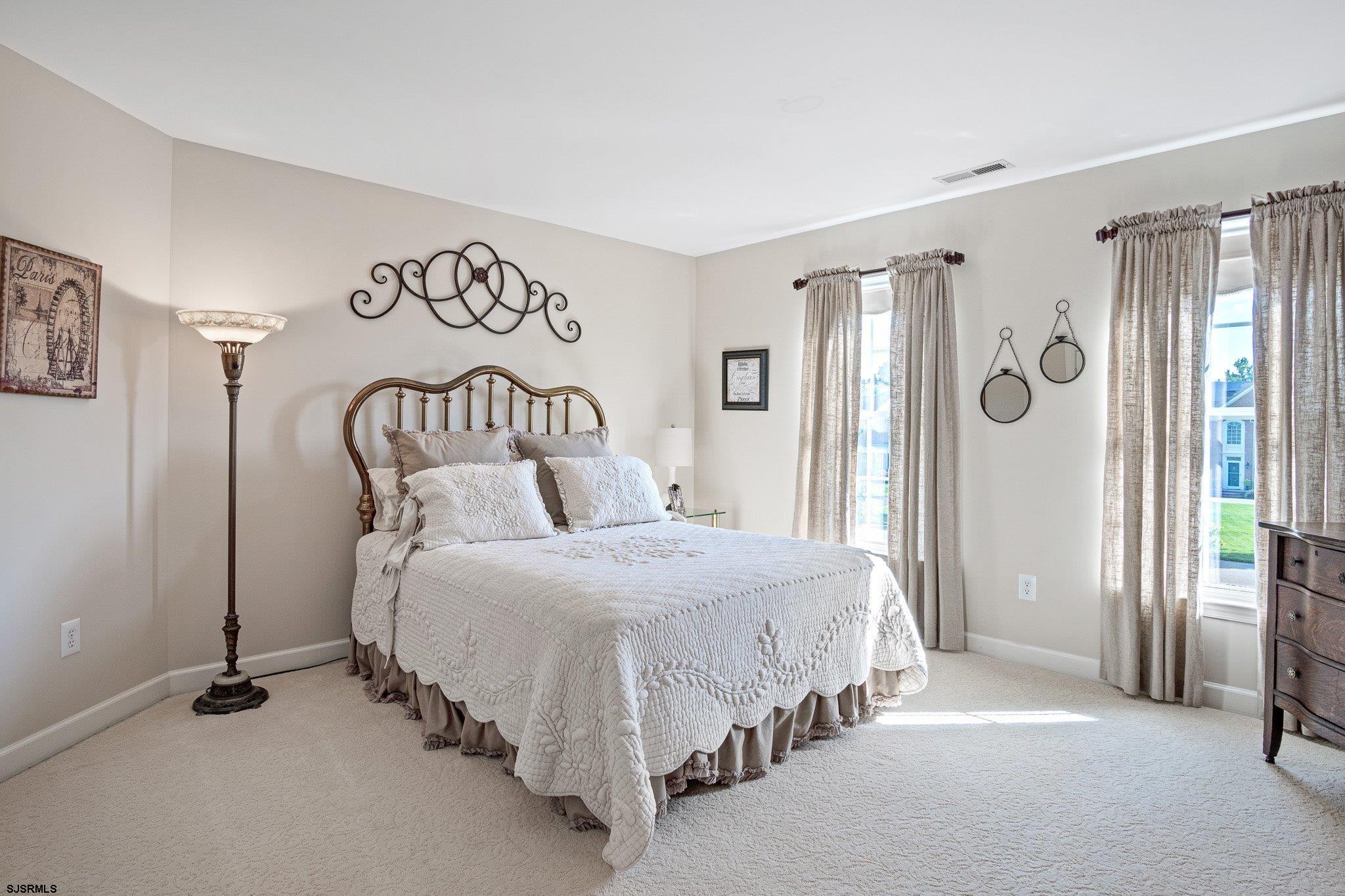 109 Quail Ridge Way Mickleton, NJ 08056 - Photo 53 of 59 a bedroom with a bed and a table
