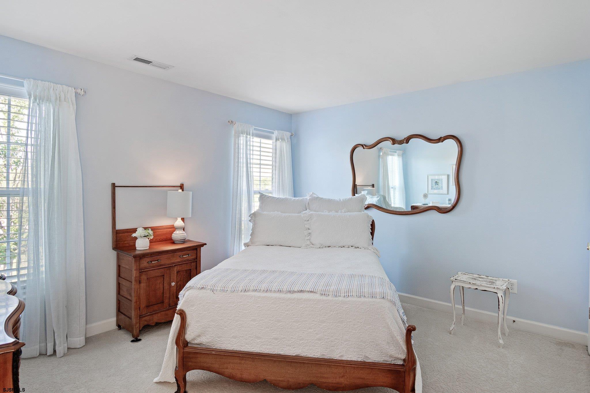 109 Quail Ridge Way Mickleton, NJ 08056 - Photo 58 of 59 a bedroom with a bed and window