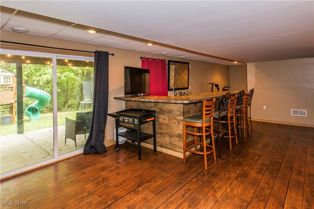 16727 Galehouse Road Doylestown, OH 44230 - Photo 29 of 38 Bar with dark wood-type flooring