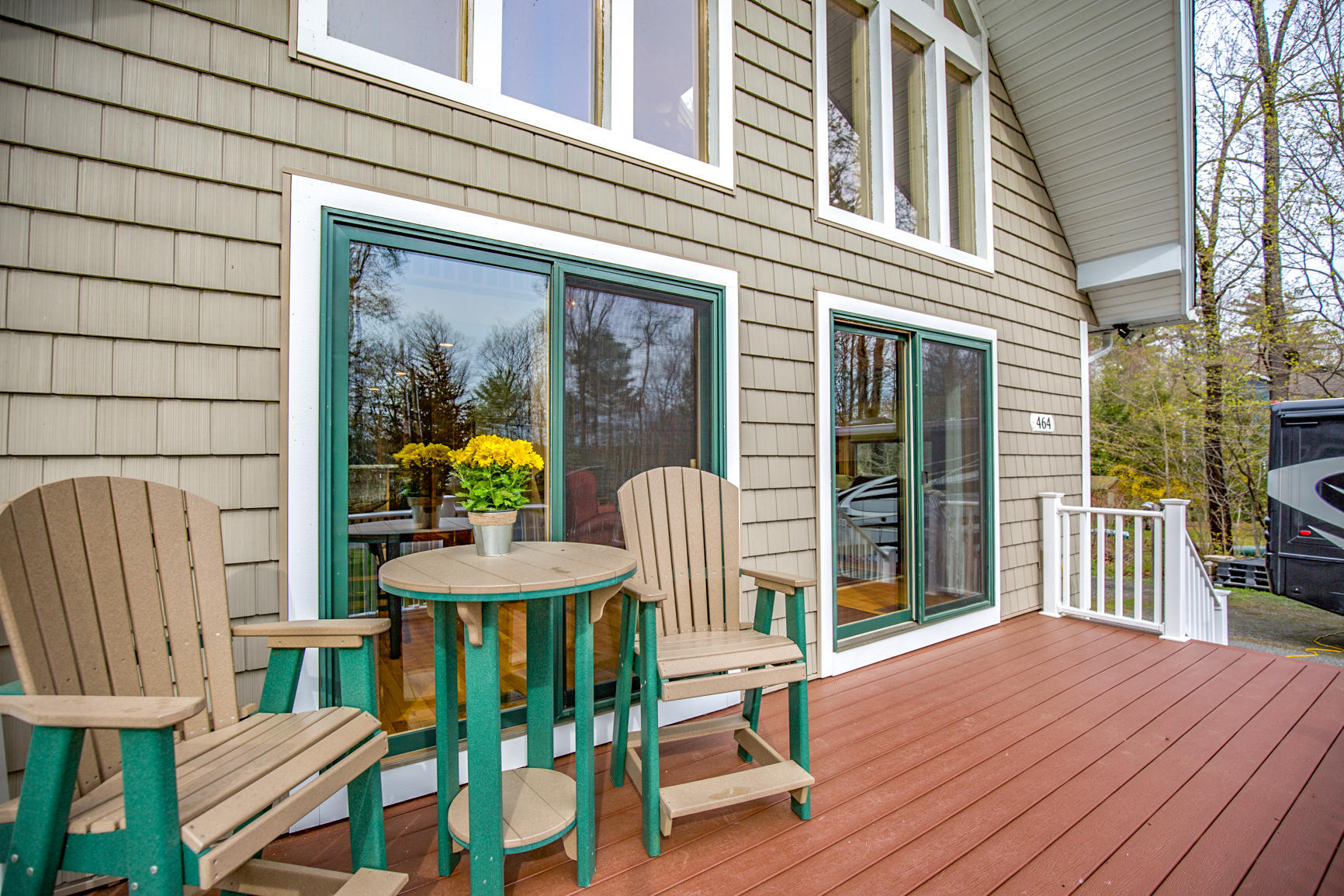 464 Pine Road Otis, MA 01029 - Photo 3 of 43 a view of a two chairs in the balcony