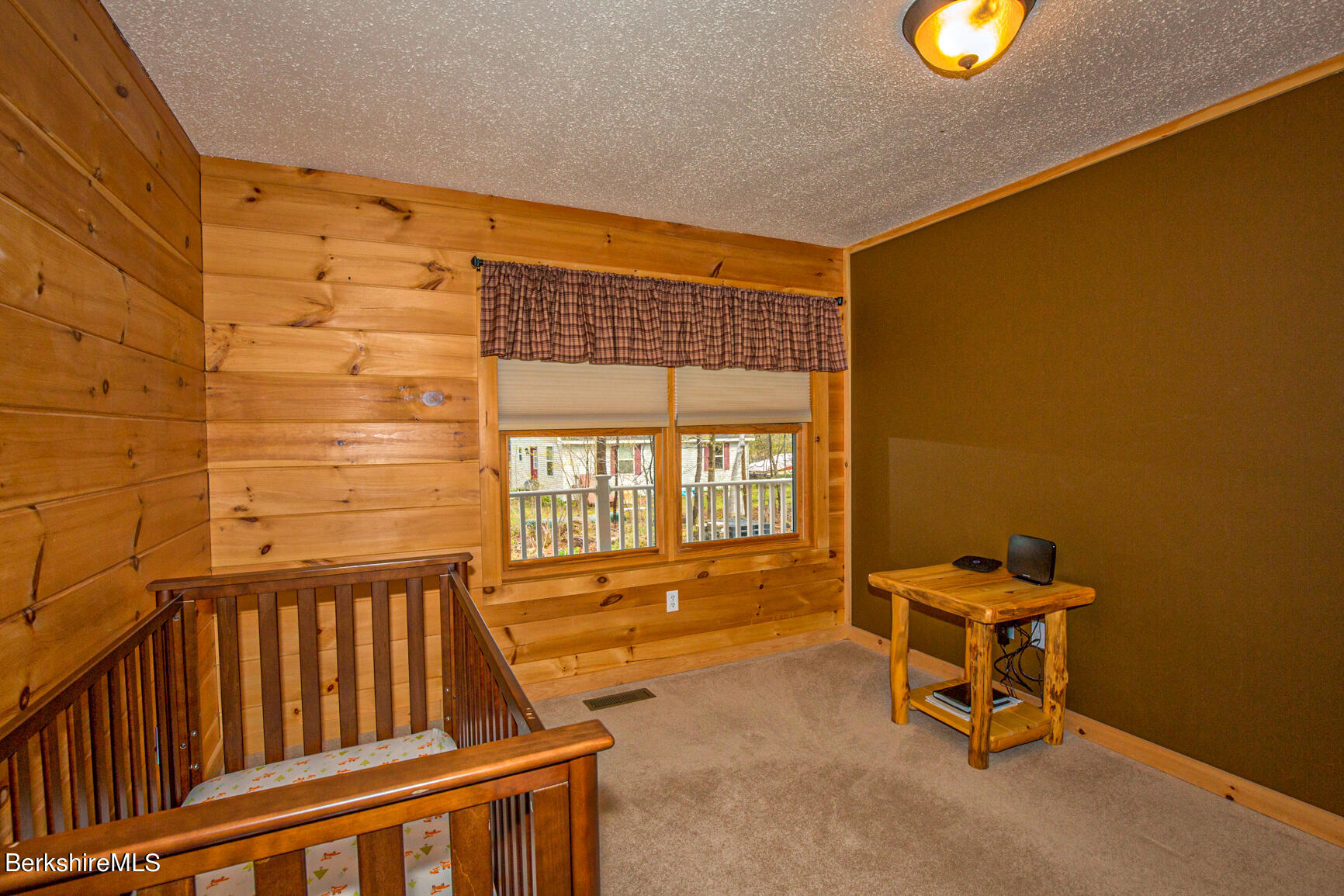 464 Pine Road Otis, MA 01029 - Photo 22 of 43 a view of a livingroom with furniture and a window