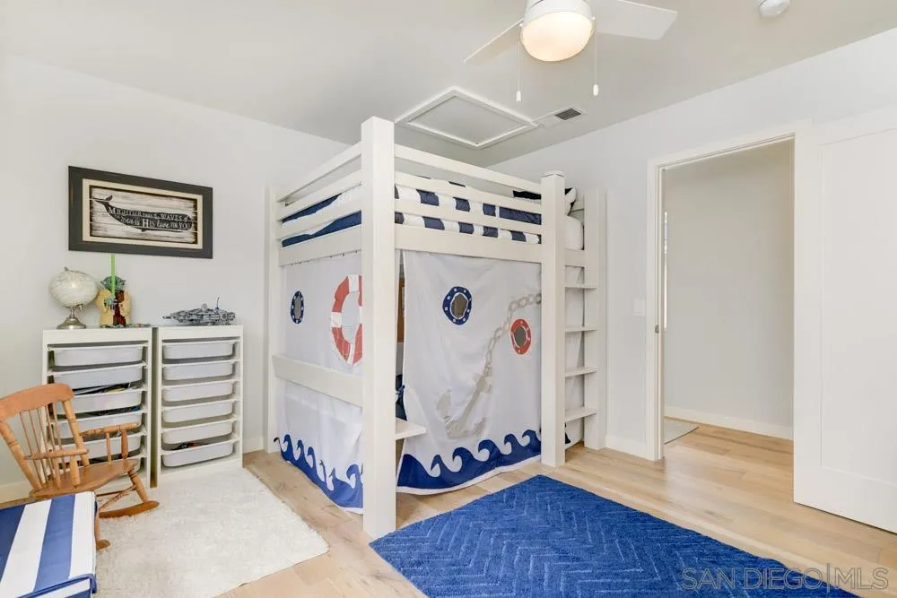 124 Breakwater Road Carlsbad, CA 92011 - Photo 11 of 20 a white refrigerator freezer sitting inside of a kitchen