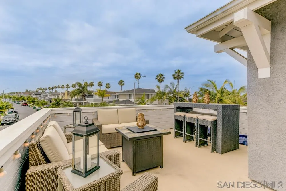 124 Breakwater Road Carlsbad, CA 92011 - Photo 16 of 20 a view of a chairs and table in patio