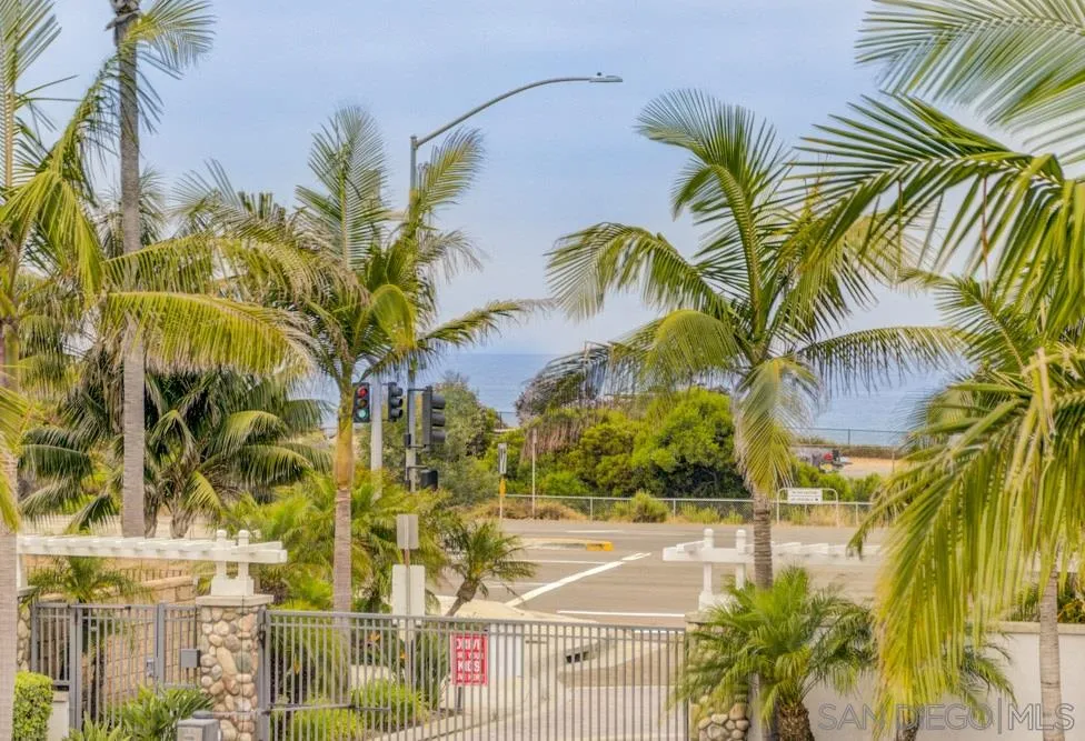 124 Breakwater Road Carlsbad, CA 92011 - Photo 17 of 20 a view of a palm trees front of a building