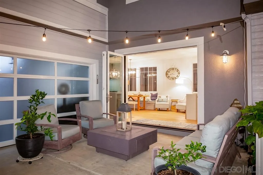 124 Breakwater Road Carlsbad, CA 92011 - Photo 18 of 20 a lobby with furniture and a potted plant