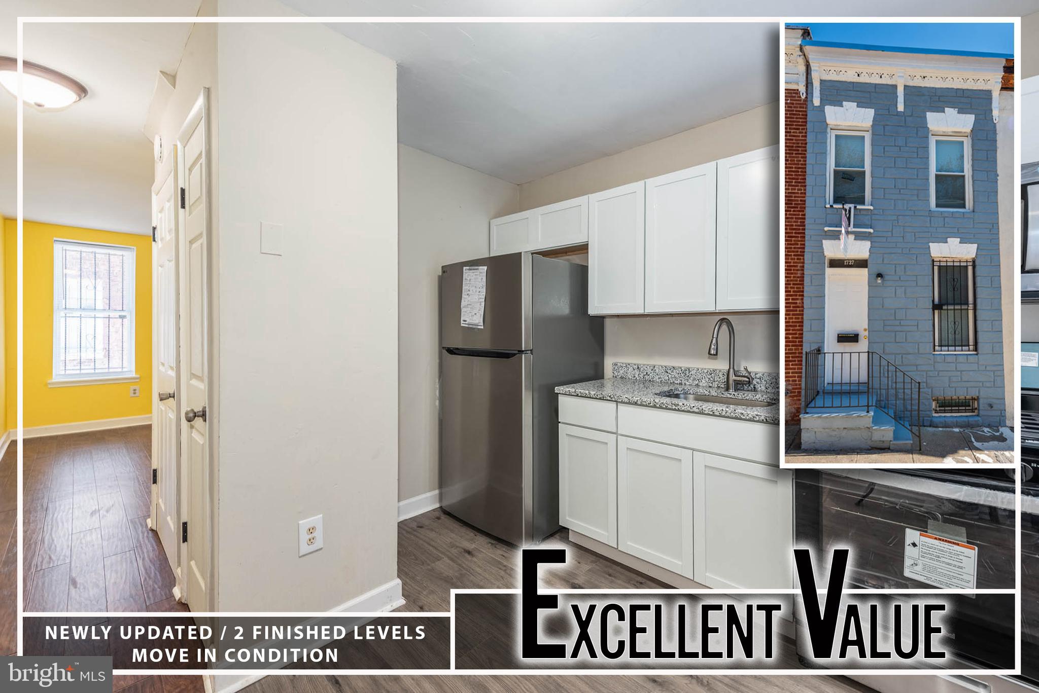 a kitchen with kitchen island granite countertop a refrigerator and a stove