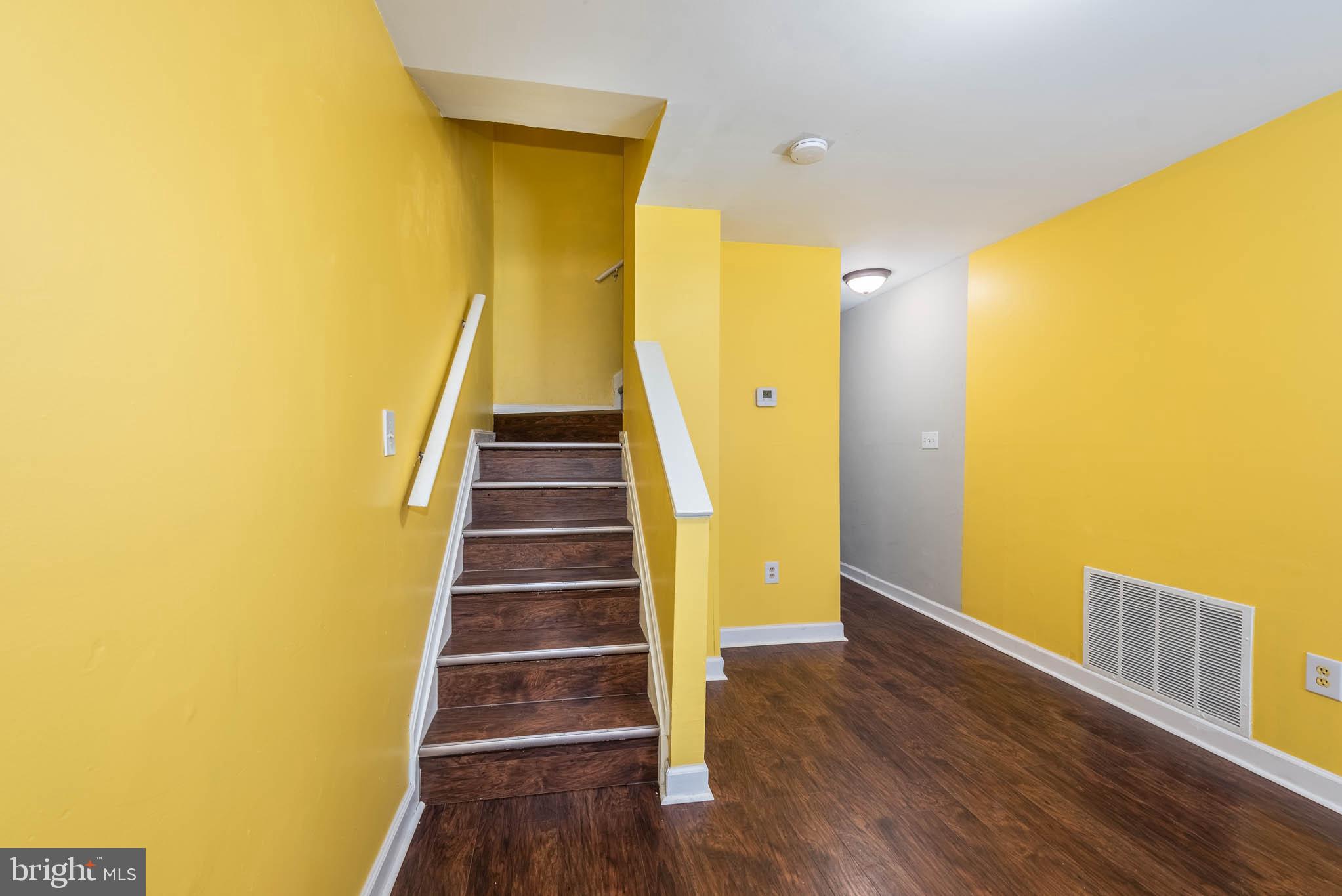 1737 North Dallas Street Baltimore, MD 21213 - Photo 3 of 14 a view of entryway with wooden floor