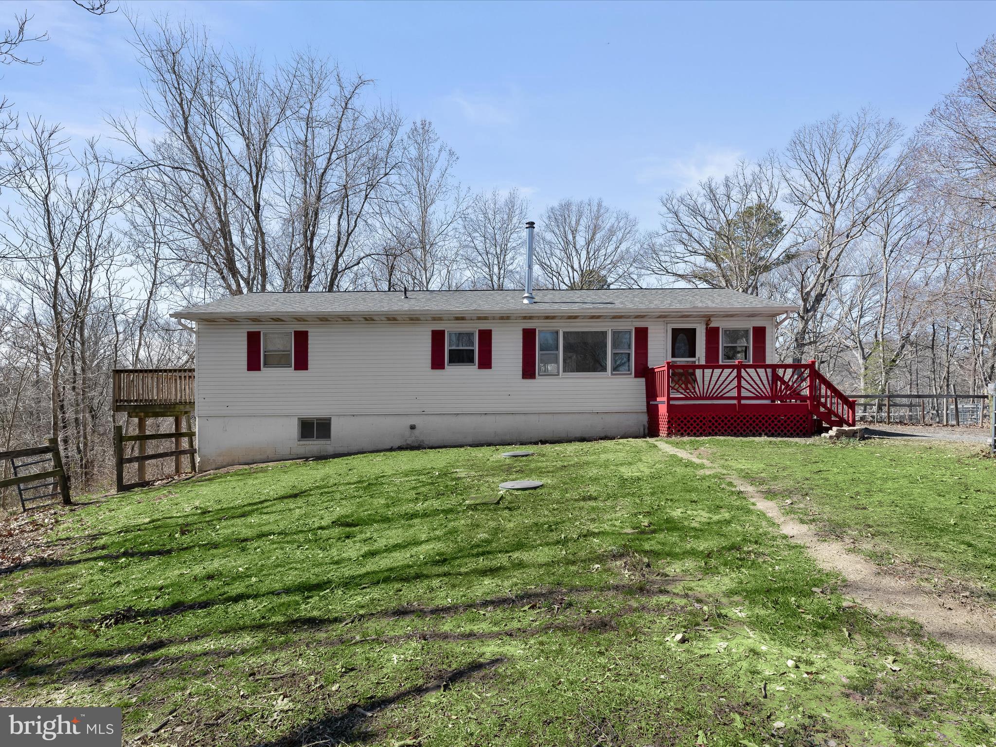 1970 Lower Marlboro Road Huntingtown, MD 20639 - Photo 1 of 81 a view of a house with a backyard and a patio