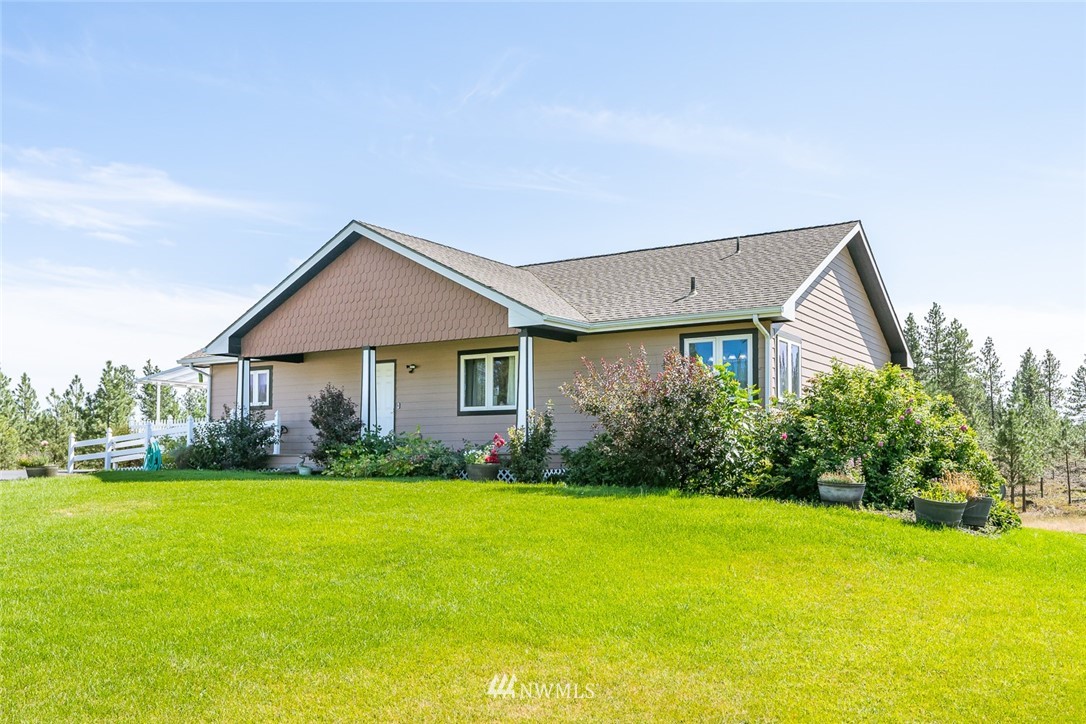 a view of a house with garden