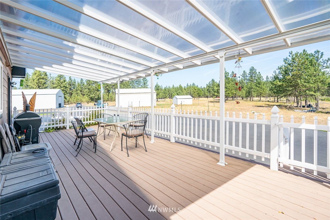 19922 South Smythe Road Spangle, WA 99031 - Photo 24 of 37 a view of a patio with a patio