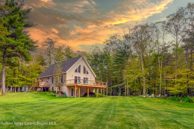 a view of a house with a big yard