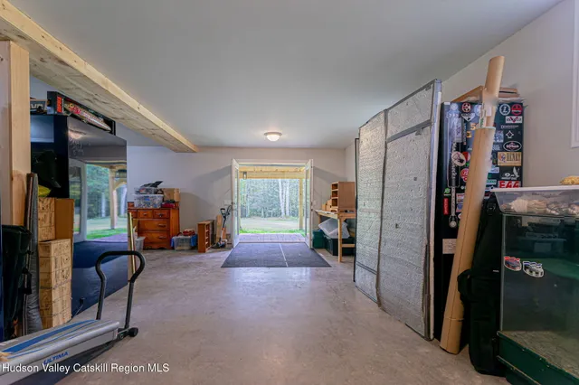 a view of a livingroom with furniture and a livingroom