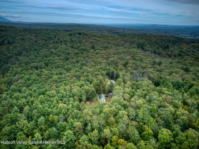 a view of a yard with an outdoor space
