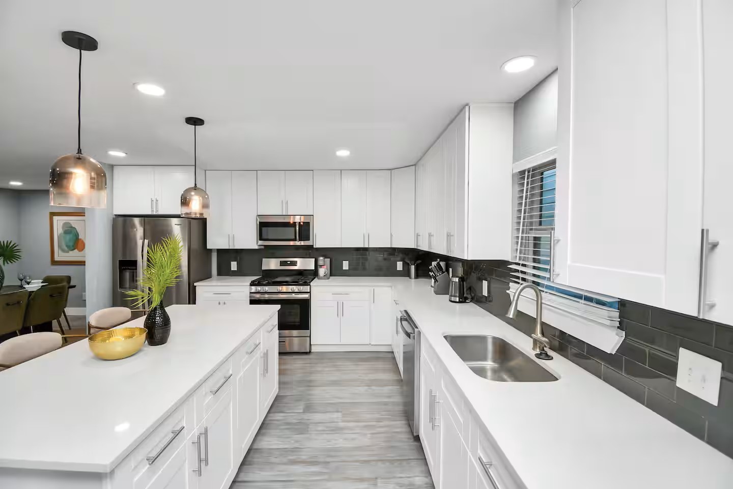 3318 Wichita Street Houston, TX 77004 - Photo 7 of 36 a kitchen with a sink stove and refrigerator