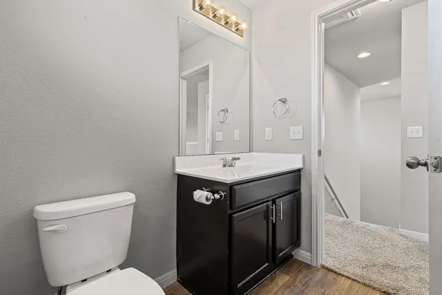 a view of a swimming pool with a table and chairs