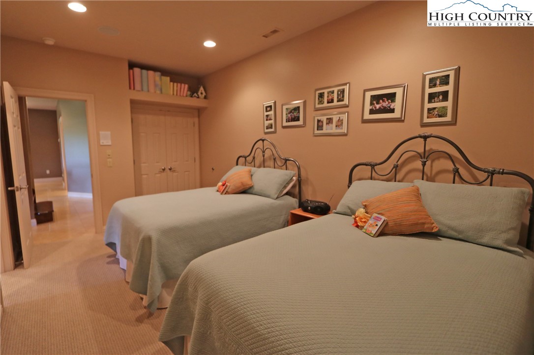 1352 West Deep Ford Road Lansing, NC 28643 - Photo 34 of 50 a bedroom with two beds and a desk