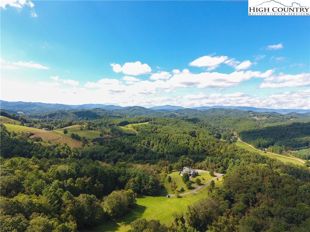 1352 West Deep Ford Road Lansing, NC 28643 - Photo 4 of 50 a view of lake with mountain