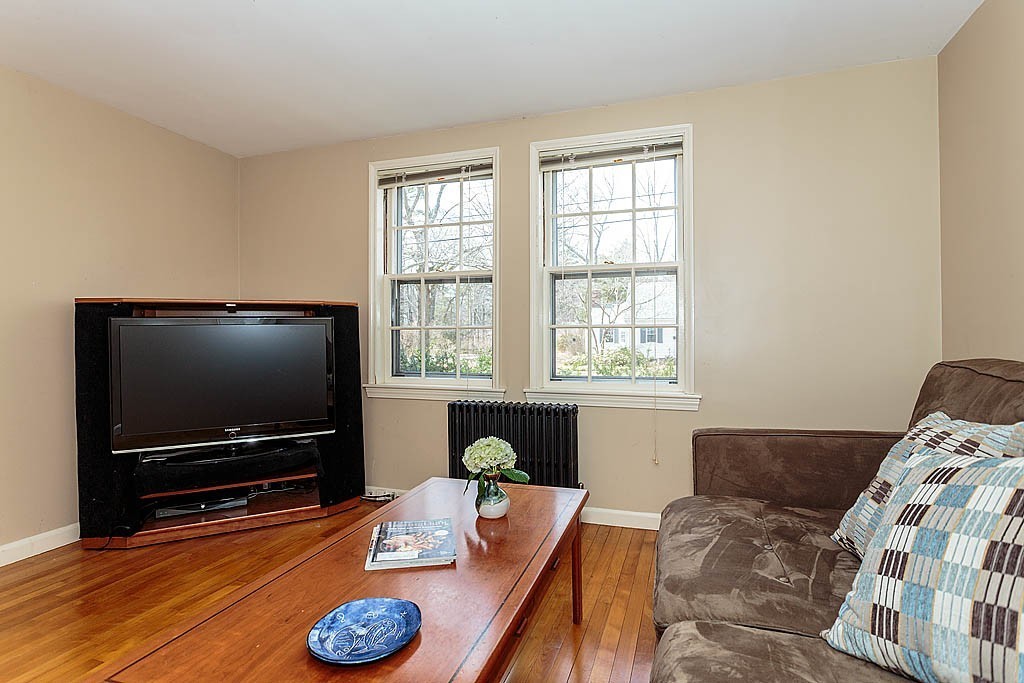 30 Munroe Road Lexington, MA 02421 - Photo 14 of 29 a living room with furniture and a flat screen tv