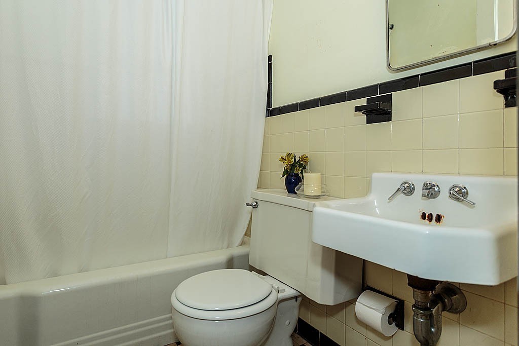 30 Munroe Road Lexington, MA 02421 - Photo 16 of 29 a bathroom with a sink toilet and a tub