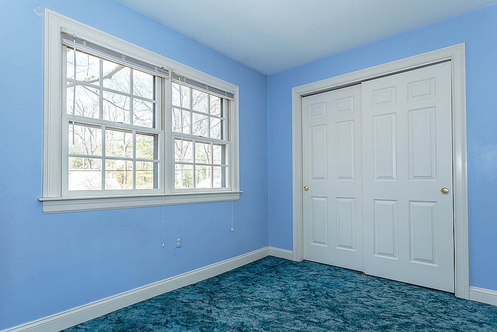 30 Munroe Road Lexington, MA 02421 - Photo 20 of 29 a view of an empty room with a window