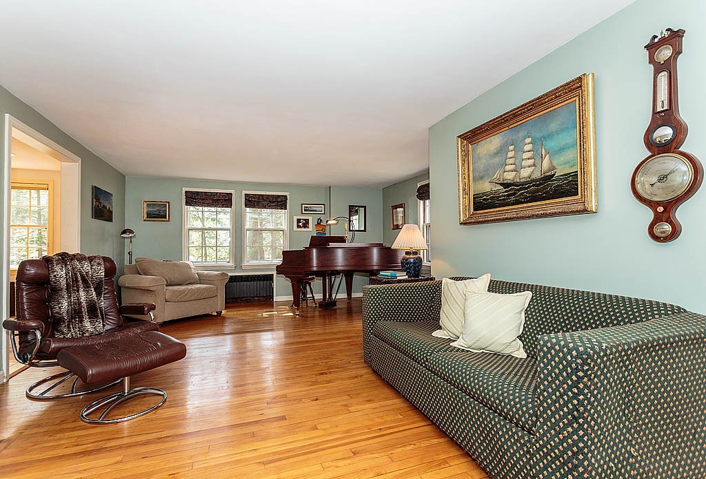30 Munroe Road Lexington, MA 02421 - Photo 4 of 29 a living room with furniture and wooden floor