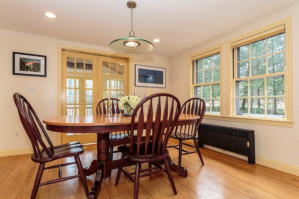 30 Munroe Road Lexington, MA 02421 - Photo 7 of 29 a view of a dining room with furniture wooden floor and chandelier