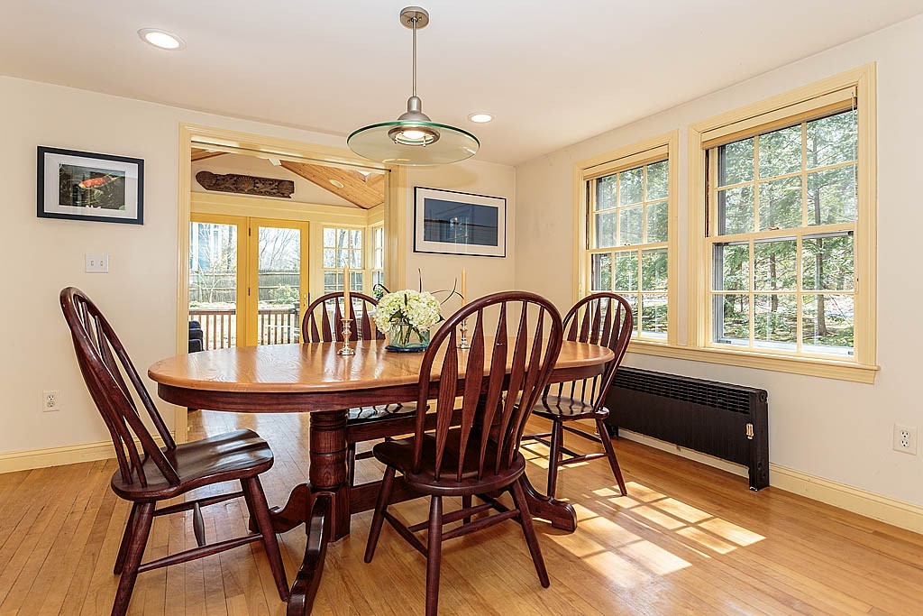 30 Munroe Road Lexington, MA 02421 - Photo 8 of 29 a view of a dining room with furniture wooden floor and chandelier