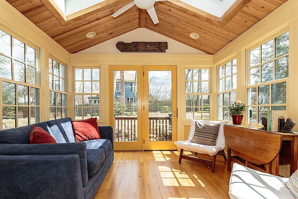 30 Munroe Road Lexington, MA 02421 - Photo 10 of 29 a living room with furniture and floor to ceiling windows