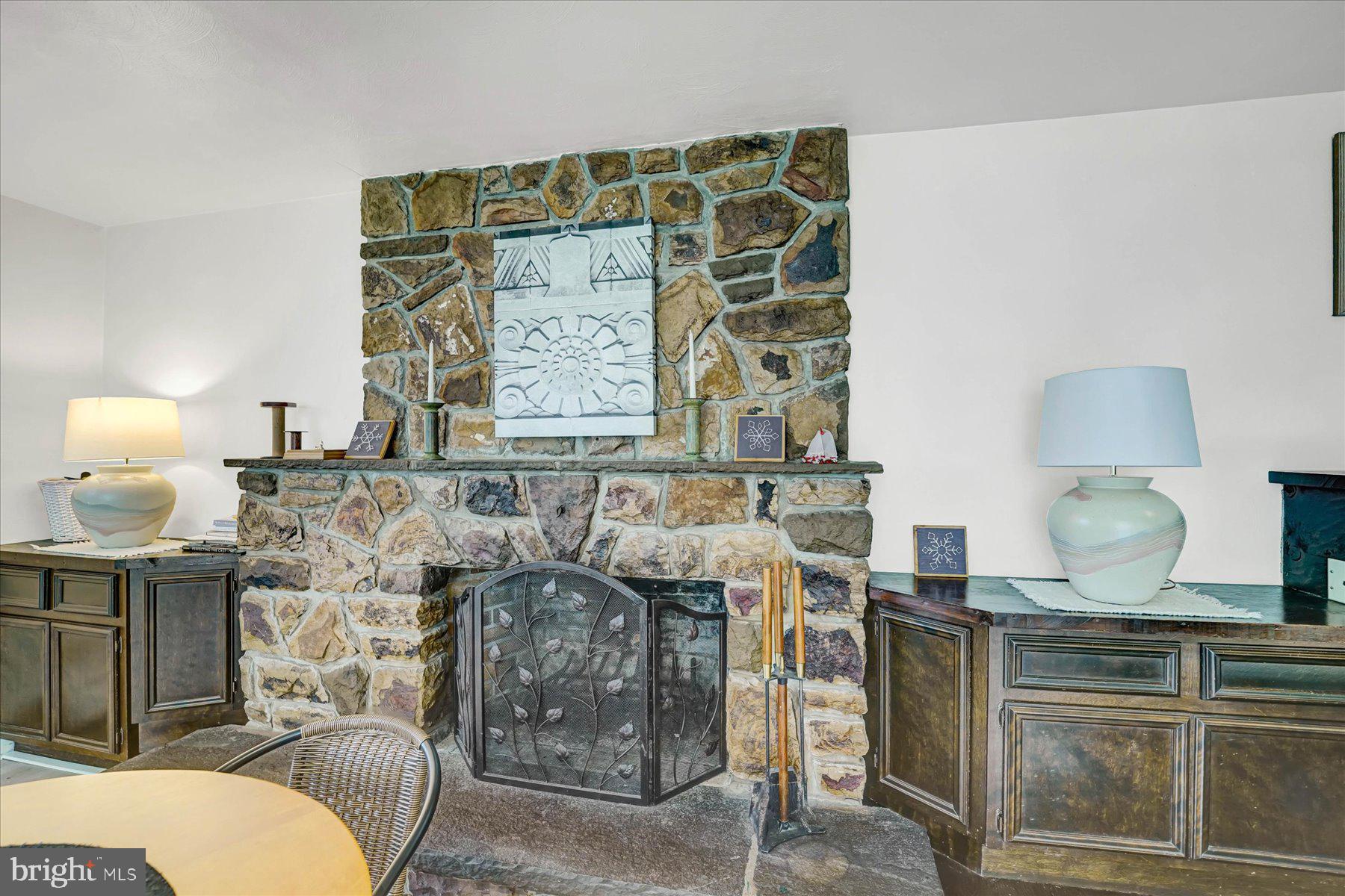 345 Spring Creek Road Bellefonte, PA 16823 - Photo 31 of 45 Rustic charm with a stone fireplace.
