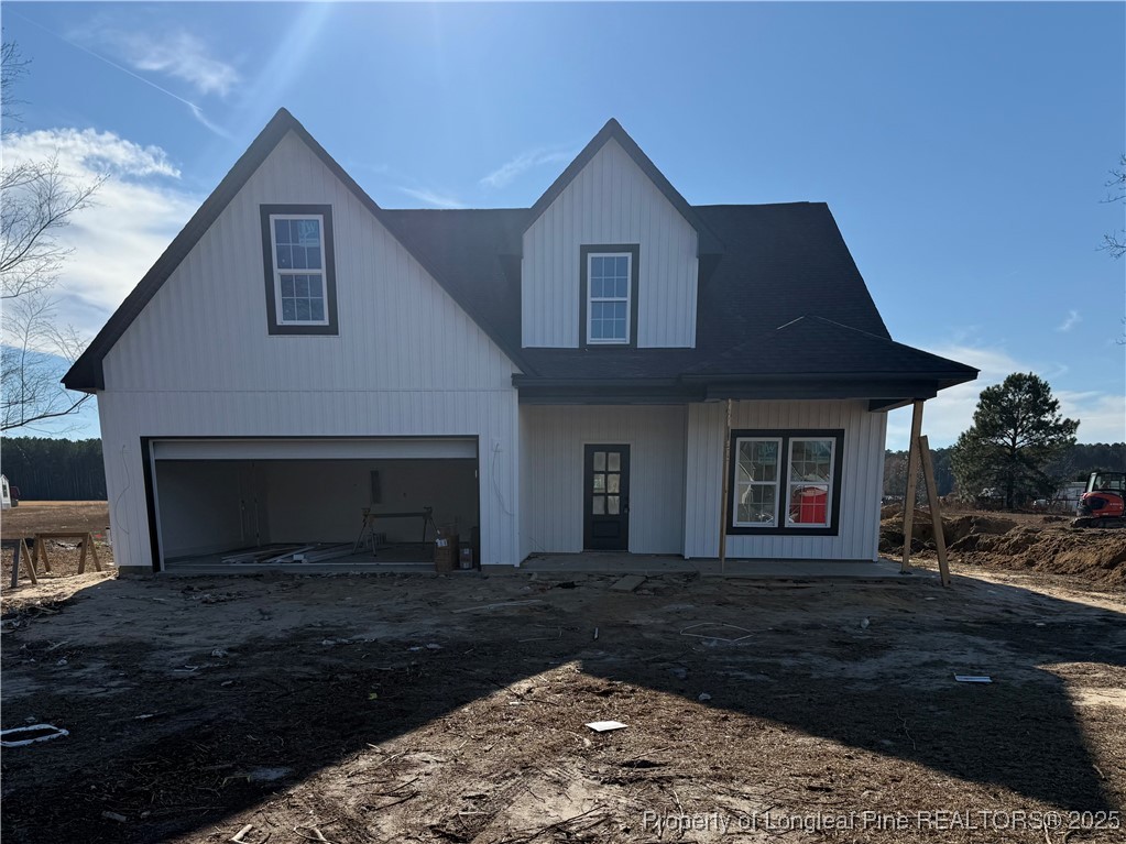 2080 Canady Pond Road Hope Mills, NC 28348 - Photo 1 of 20 a front view of a house with a yard