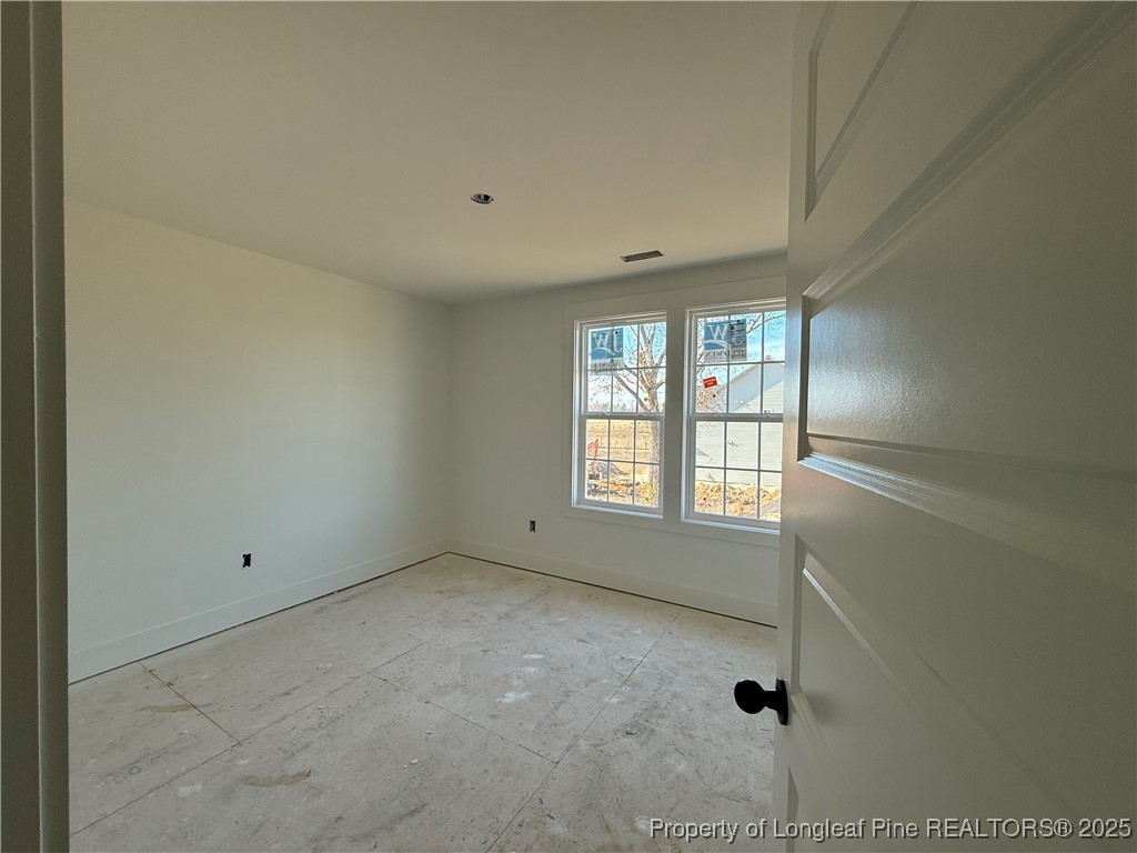 2080 Canady Pond Road Hope Mills, NC 28348 - Photo 14 of 20 a view of an empty room with a window