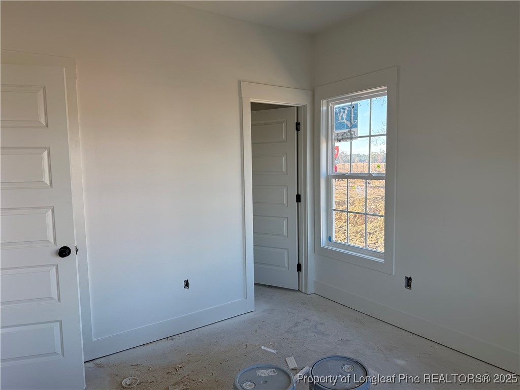 2080 Canady Pond Road Hope Mills, NC 28348 - Photo 4 of 20 a view of an empty room with a window
