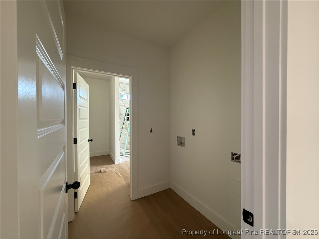 2080 Canady Pond Road Hope Mills, NC 28348 - Photo 9 of 20 a view of a hallway with a elevator