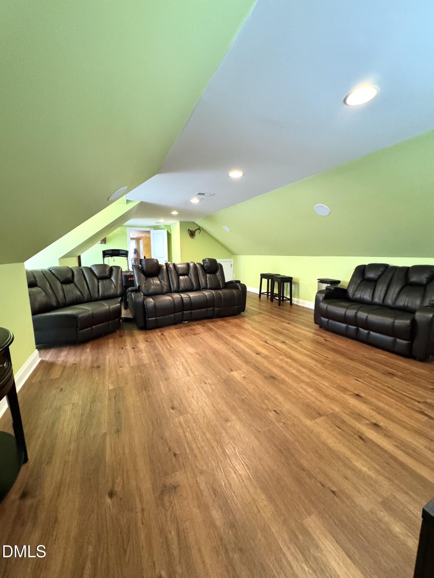 640 Tart Town Road Dunn, NC 28334 - Photo 47 of 71 a living room with furniture and a flat screen tv