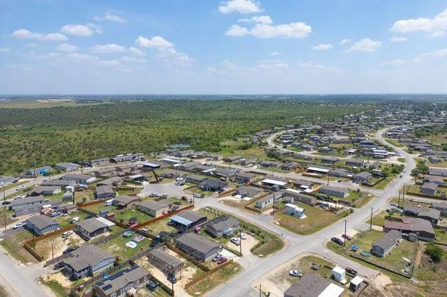 an aerial view of a city with lots of residential buildings