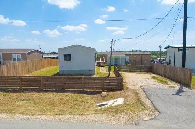 a view of a house with a patio