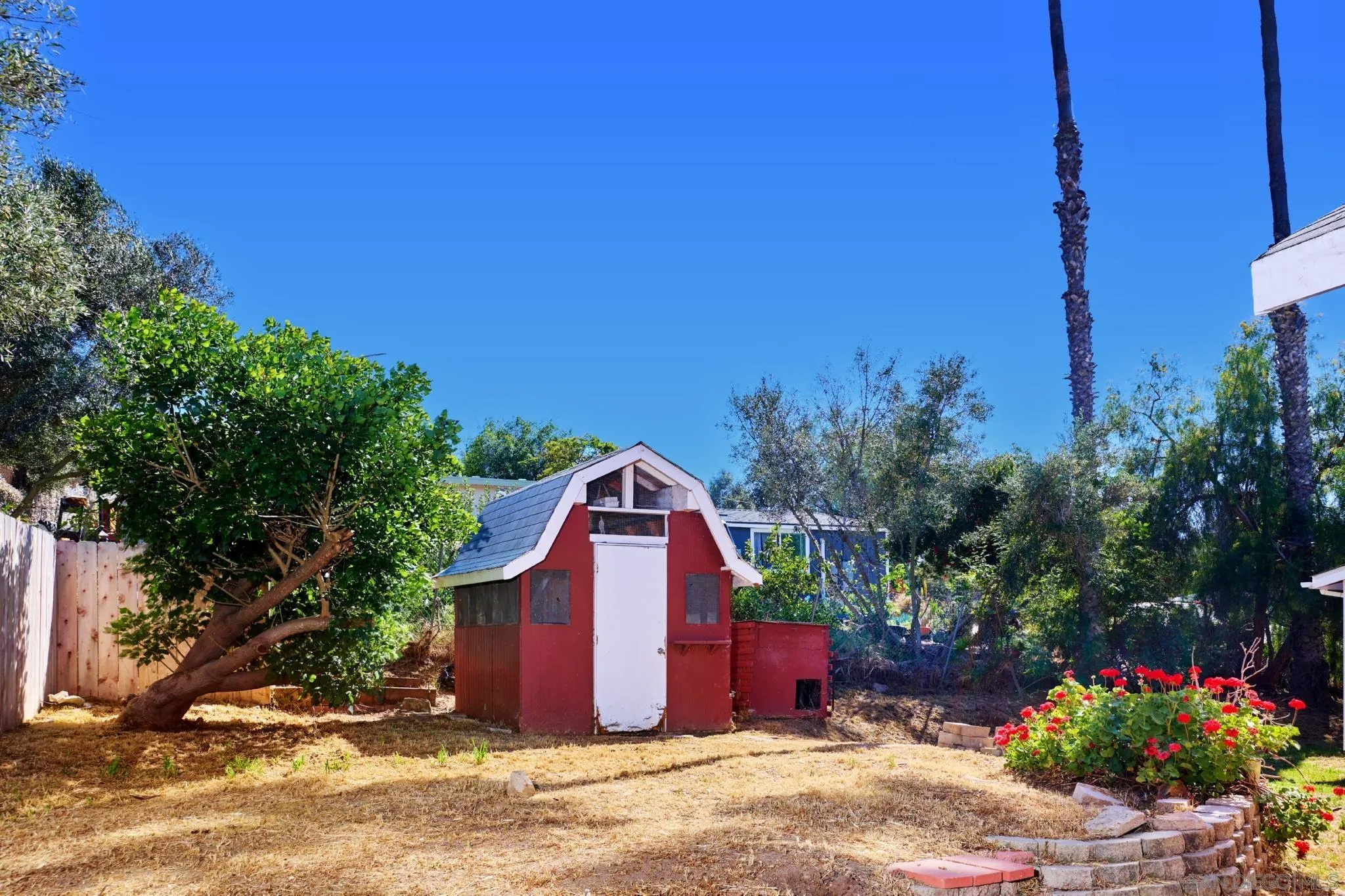 3043-45 Helix Street Spring Valley, CA 91977 - Photo 20 of 20 Cute barn shed (former chicken coop) houses the laundry room for both houses