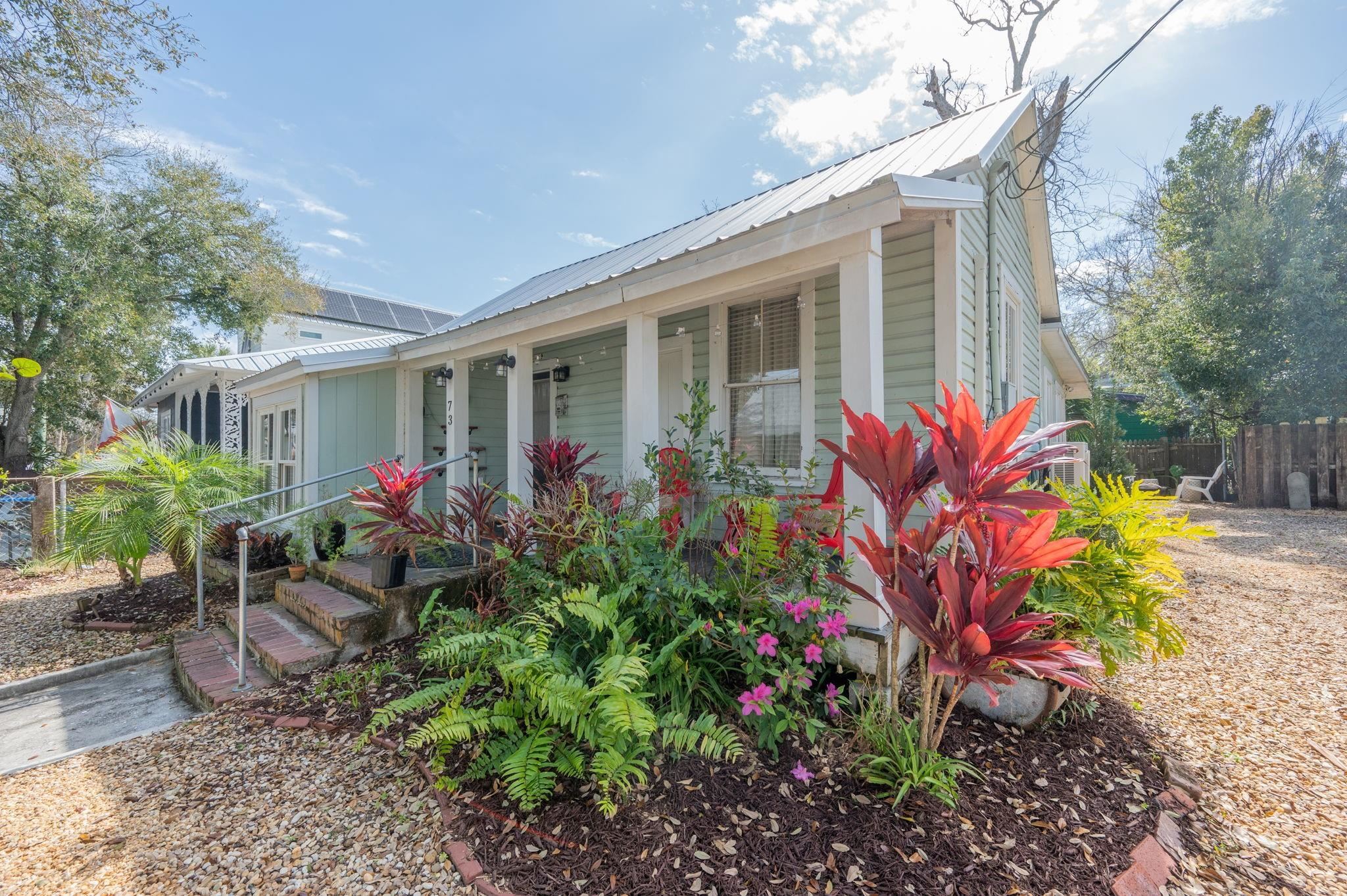 front view of a house with a yard