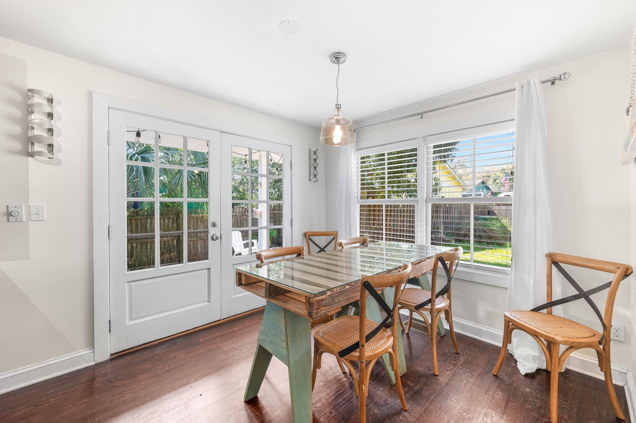 73 Kings Ferry Way St. Augustine, FL 32084 - Photo 23 of 71 a view of a dining room with furniture window and wooden floor