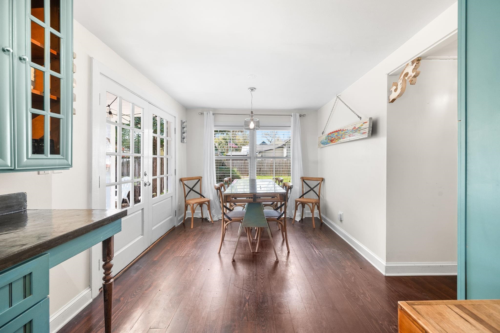 73 Kings Ferry Way St. Augustine, FL 32084 - Photo 24 of 71 a dining room with wooden floor and large window