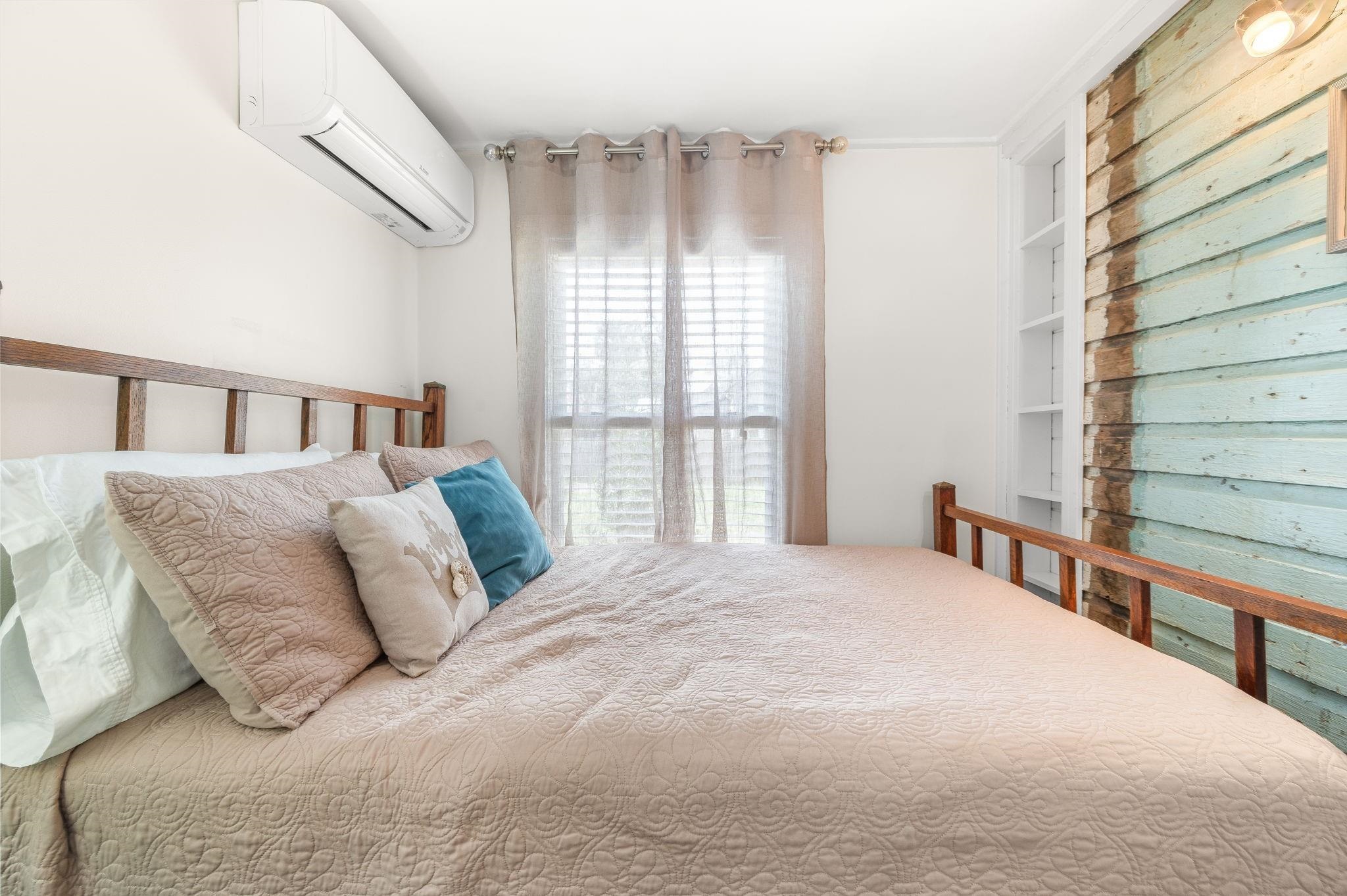 73 Kings Ferry Way St. Augustine, FL 32084 - Photo 45 of 71 a bedroom with a bed and a window