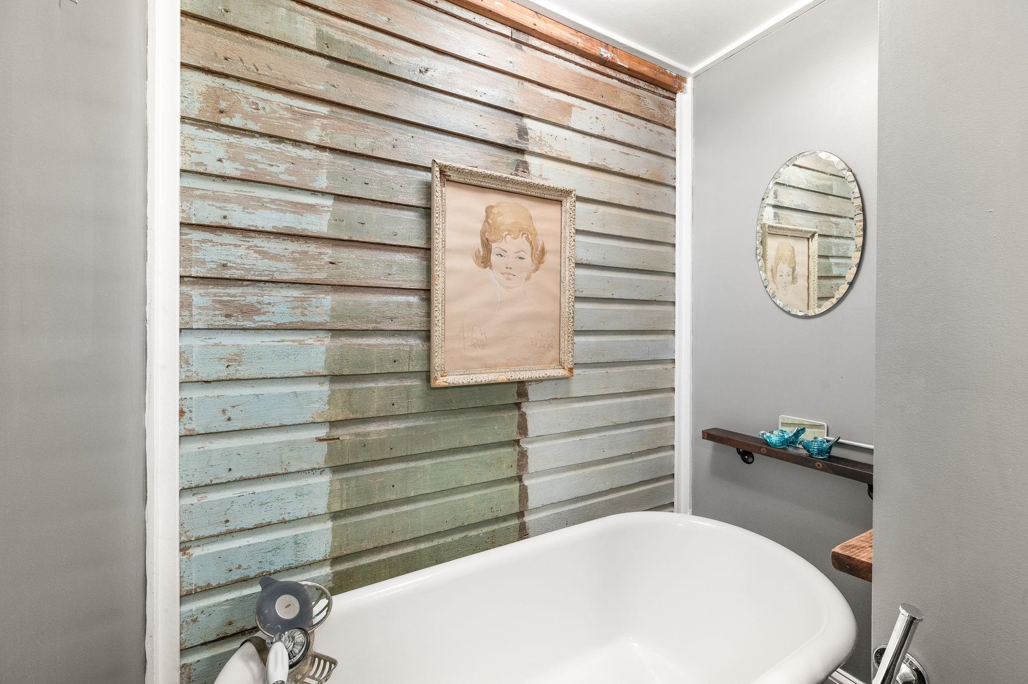 73 Kings Ferry Way St. Augustine, FL 32084 - Photo 50 of 71 a bathroom with a bathtub and a window