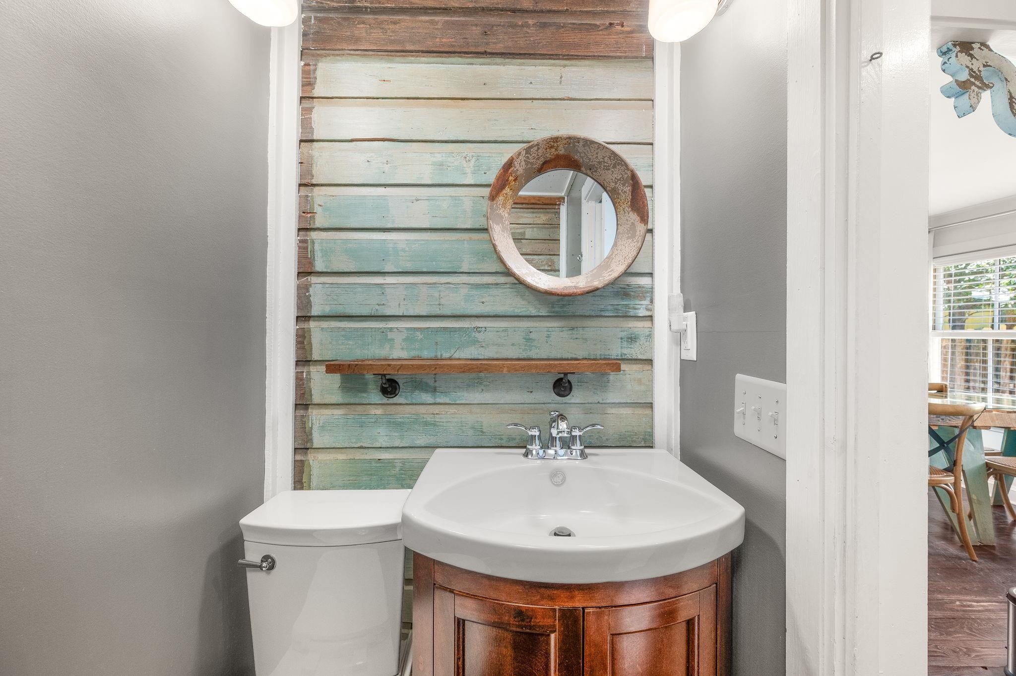 73 Kings Ferry Way St. Augustine, FL 32084 - Photo 51 of 71 a bathroom with a sink and a mirror