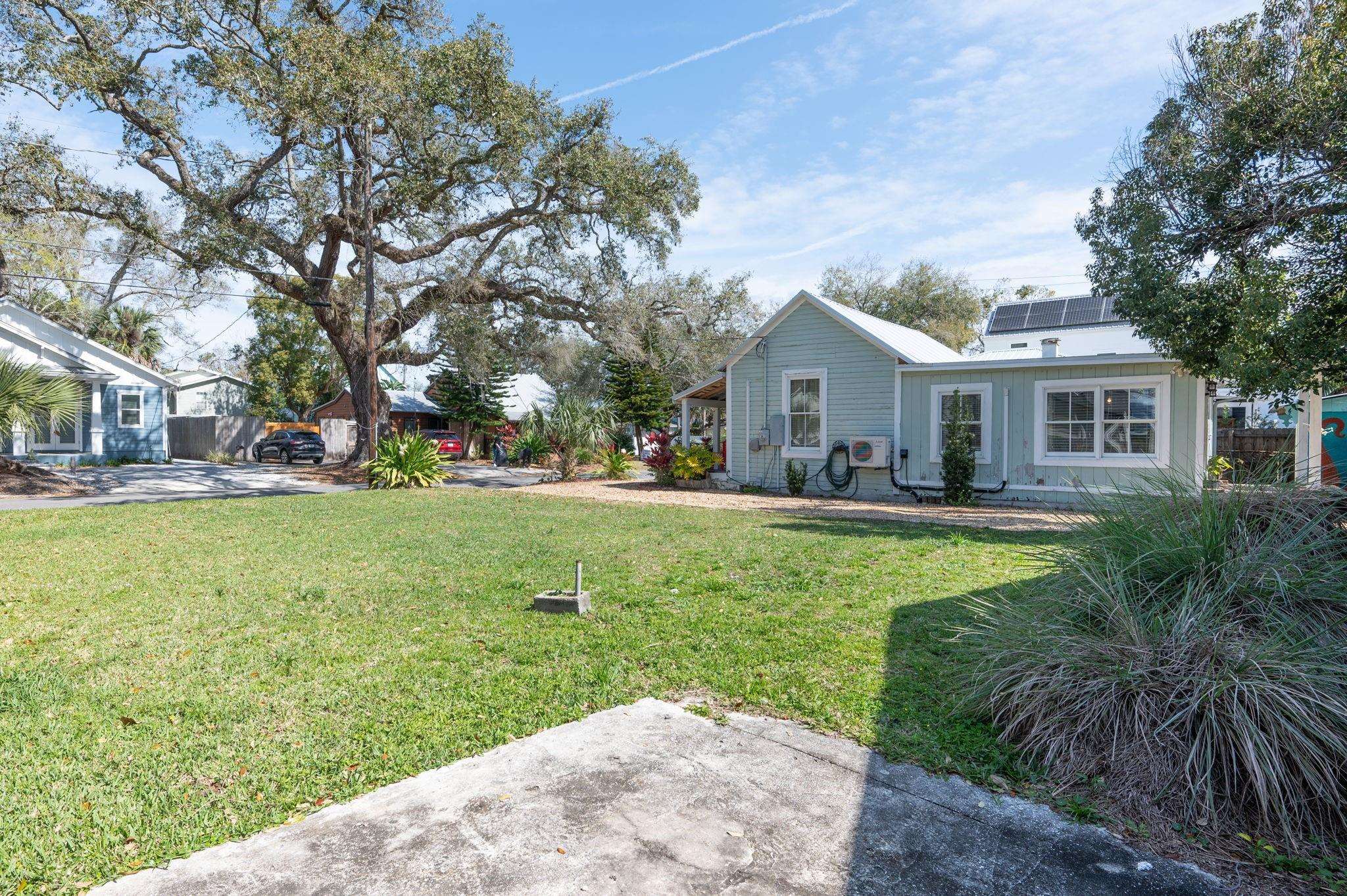 73 Kings Ferry Way St. Augustine, FL 32084 - Photo 56 of 71 a front view of house with yard and green space