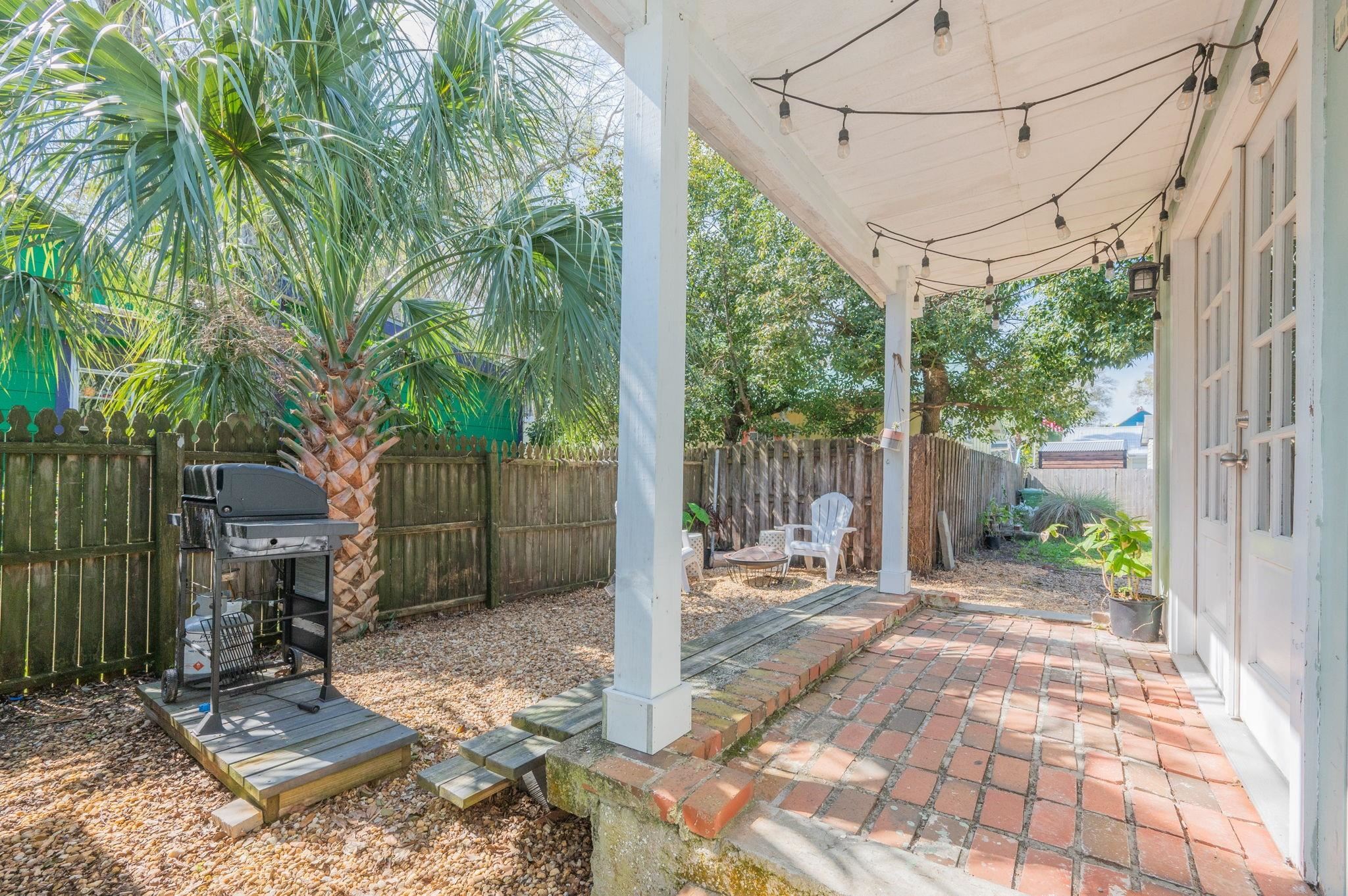 73 Kings Ferry Way St. Augustine, FL 32084 - Photo 60 of 71 a backyard of a house with lots of green space