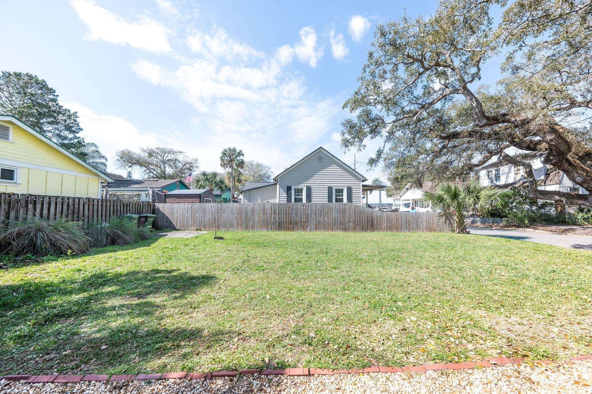 73 Kings Ferry Way St. Augustine, FL 32084 - Photo 6 of 71 a front view of house with yard and garage