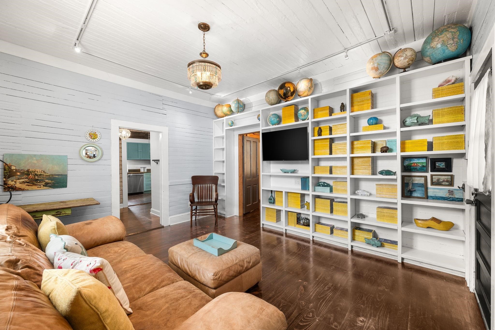 73 Kings Ferry Way St. Augustine, FL 32084 - Photo 7 of 71 a living room with furniture and flat screen tv