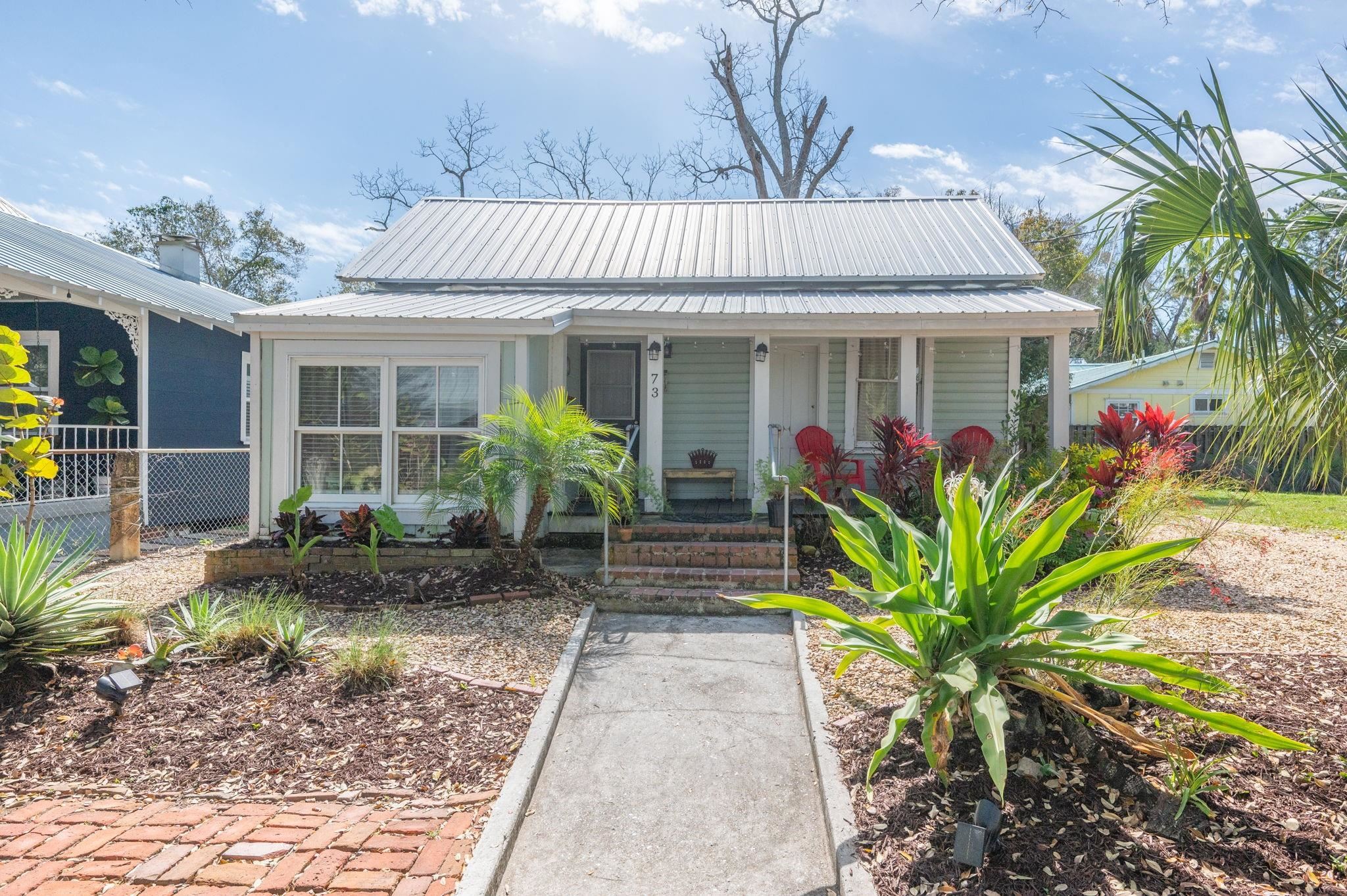 73 Kings Ferry Way St. Augustine, FL 32084 - Photo 71 of 71 a view of a house with potted plants