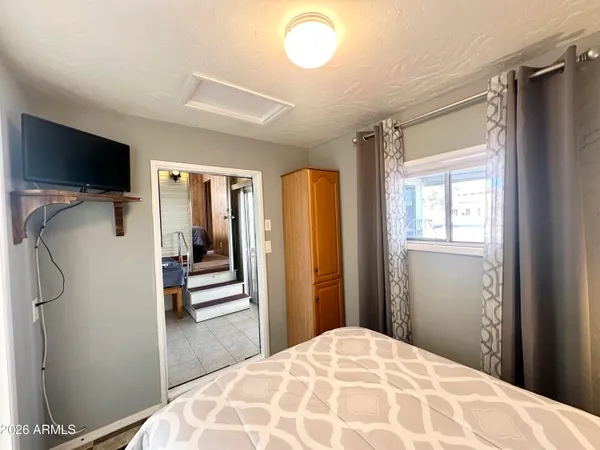 a utility room with sink dryer and washer