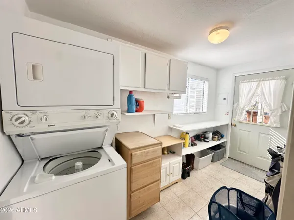 a kitchen with a stove a sink and a refrigerator